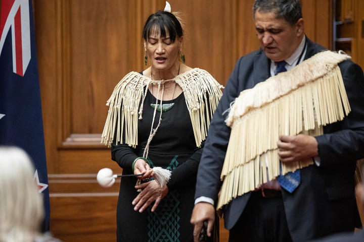 Alisiha Mansell joins Kura Moeahu in a chanted waiata with poi as percussion.