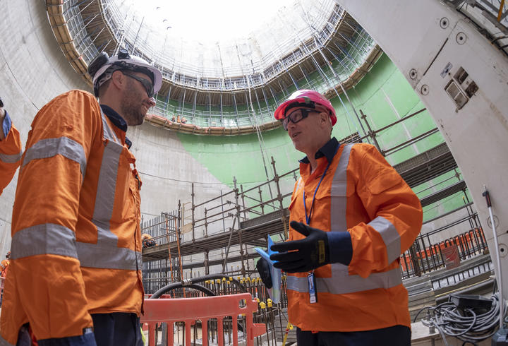 Watercare Central Interceptor lead engineer Bojan Jovanovic talks to chief executive Jon Lamonte in an underground shaft where the project's first stage of tunnelling from Māngere to Mount Roskill started in July.