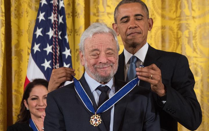 US President Barack Obama presents the Presidential Medal of Freedom to theater composer and lyricist Stephen Sondheim at the White House in Washington, DC, on November 24, 2015.  AFP PHOTO/NICHOLAS KAMM (Photo by NICHOLAS KAMM / AFP)