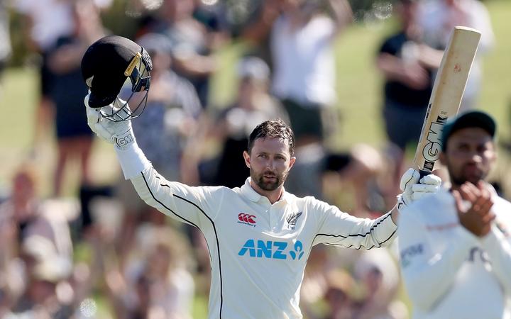 Blackcaps Devon Conway celebrates 100 runs during play on day one of the first cricket test between Bangladesh and New Zealand at Bay Oval 