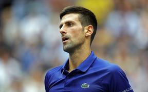  Novak Djokovic of Serbia looks on as he plays against Daniil Medvedev of Russia during their Men's Singles final match on Day Fourteen of the 2021 US Open at the USTA Billie Jean King National Tennis Center on September 12, 2021 in New York City.  