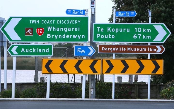 A collection of road signs at a spot on State Highway 12, alongside the Northern Wairoa River in Dargaville. 9 June 2020 Northern Advocate photograph by Tania Whyte
