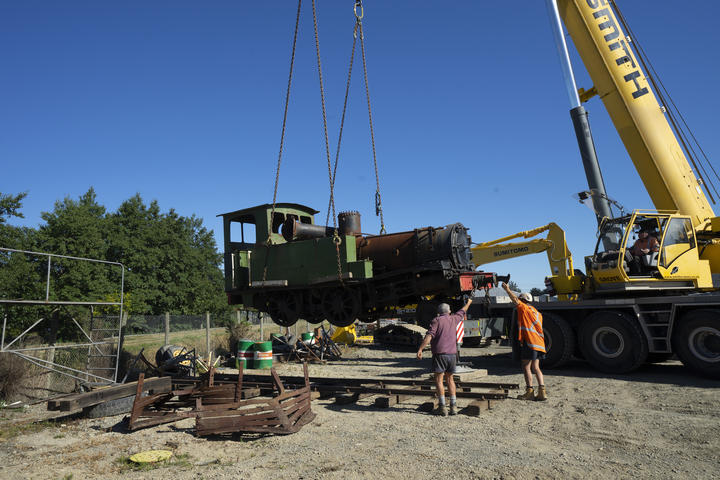 The 1880 Class D D6 locomotive is lowered into position at Bulleid Engineering in Winton on Saturday. 