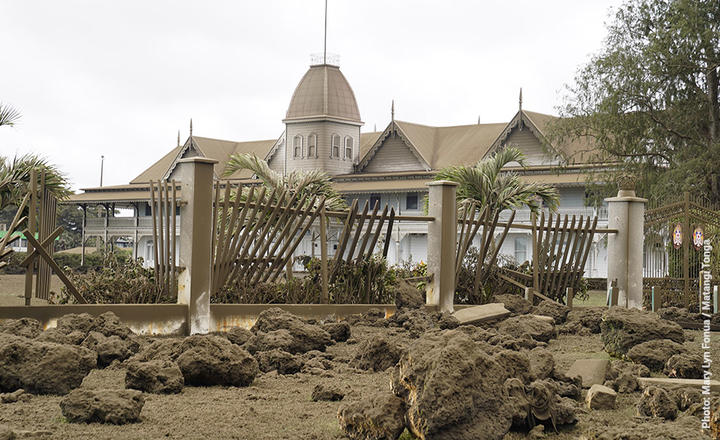 The seafront section of the Royal Palace in Nuku'alofa is blanketed in ash and there's damage to the fence and grounds from the tsunami that followed the volcanic eruption on January 15.