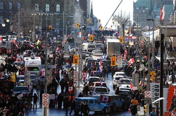 Supporters of the Freedom Convoy protest Covid-19 vaccine mandates and restrictions on 29 January, 2022 in Ottawa, Canada.