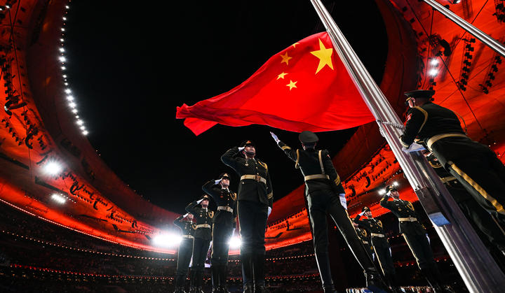 The Chinese national flag is raised during the opening ceremony of the Beijing 2022 Olympic Winter Games at the National Stadium in Beijing, capital of China, 4 February 2022.