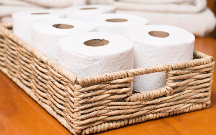Toilet paper rolls on wicker basket