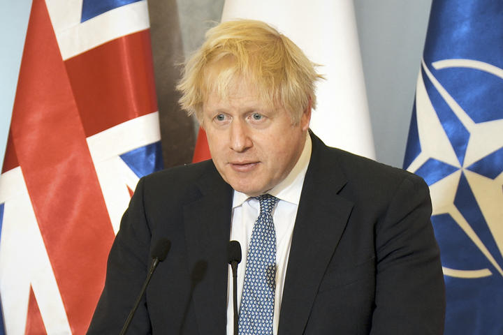 British PM Boris Johnson is seen at a press conference at the Chancellery of the Prime Minister in Warsaw, Poland on 10 February, 2022. 
