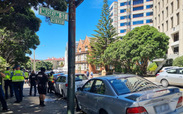 Police are moving to clear the roads outside and near Parliament as protesters continue to occupy the area for the eighth day.