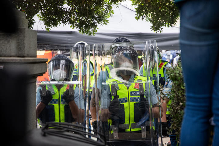 Police with shields.