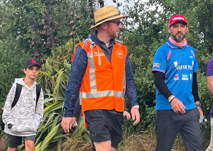 Temel Atacocugu, right, on his Walk for Peace on outskirts of Christchurch 