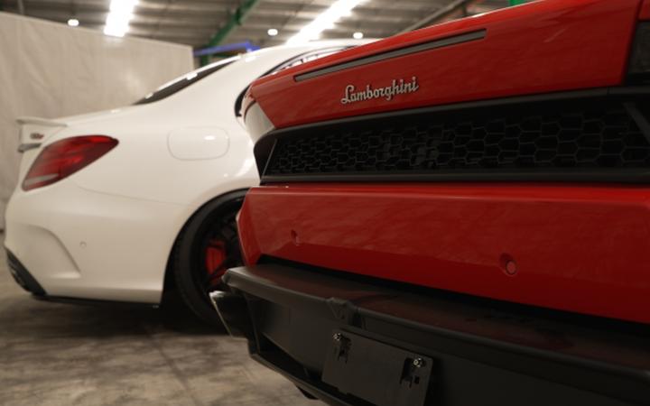 A Lamboghini Huracan restrained by police as part of the country's largest drug bust.