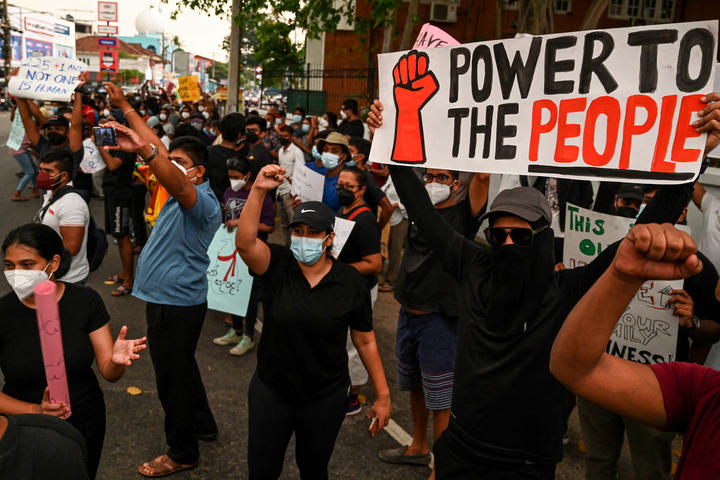 Protestors in in Colombo during a demonstration against price rises and shortages of fuel and other essential commodities, 3 April 2022.