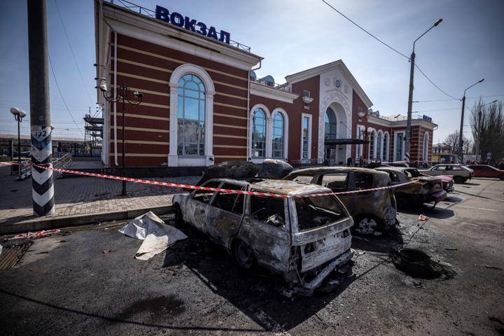 Calcinated cars are pictured outside a train station in Kramatorsk, eastern Ukraine, that was being used for civilian evacuations, after it was hit by a rocket attack killing at least 35 people, on April 8, 2022. 