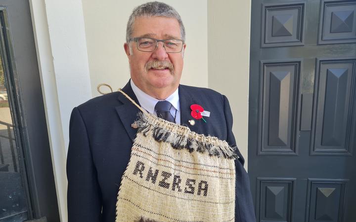 BJ Clark was gifted a kākahu maumahara, a woven cloak, to wear as president of the RSA and to be handed down to future leaders.