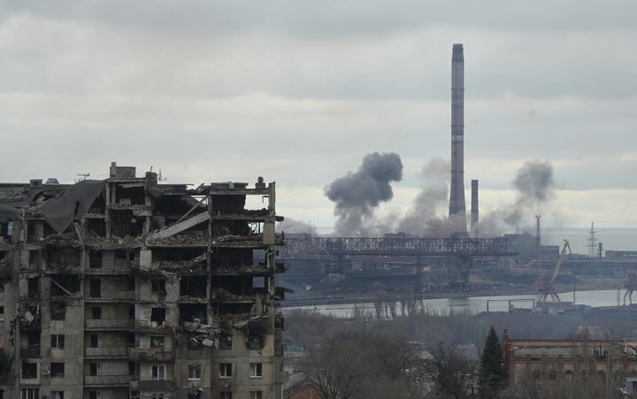 Smoke rises over the Azovstal iron and steel works company in Mariupol, Donetsk People's Republic. 