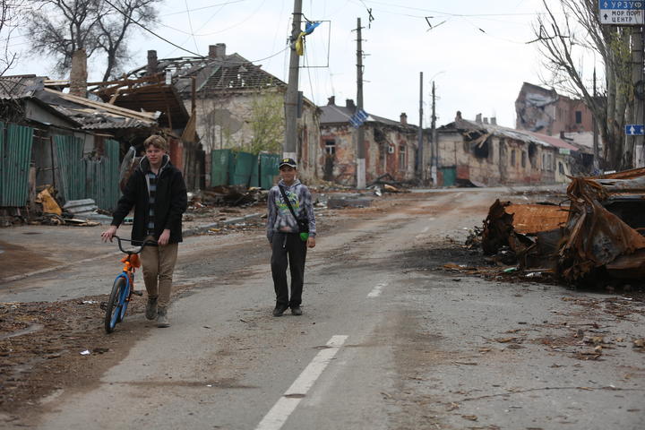 Children out on the Mariupol streets, amid the destruction, on Friday.