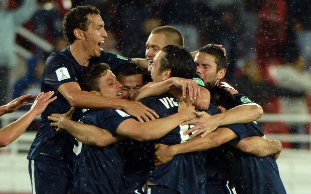 Auckland City FC players celebrate their historic win.