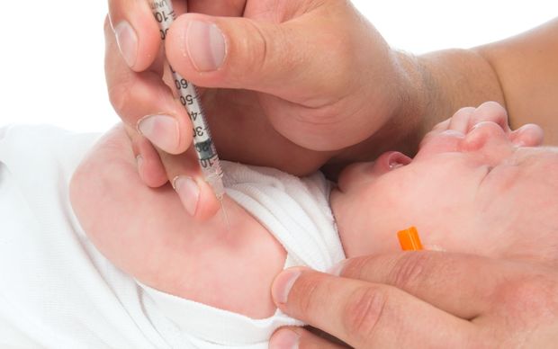 A baby is vaccinated.