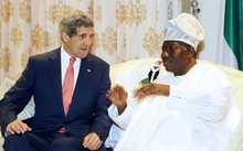 US Secretary of State John Kerry, left, meets with Nigeria's President Goodluck Jonathan at the State House in Lagos 
