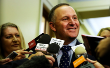 Prime Minister John Key (right) in a media scrum with RNZ Chief Parliamentary Reporter Jane Patterson.