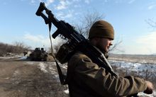 A tank of pro-Russian rebels take a position outside Uglegorsk, 6km southwest of Debaltseve.