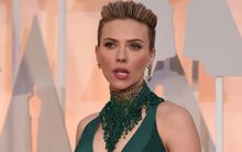 Scarlett Johansson poses on the red carpet for the 87th Oscars on February 22, 2015 in Hollywood, California