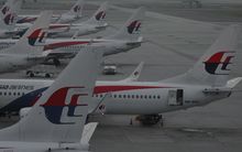 Malaysia Airlines planes at Kuala Lumpur International Airport on the day of the first anniversary of the disappearance of flight MH370.