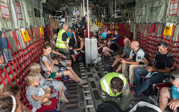 New Zealanders on an Air Force plane returning from Vanuatu.