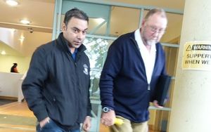 Pramod Kumar, left, and an agent for MUR Shipping at the Tauranga District Court. 