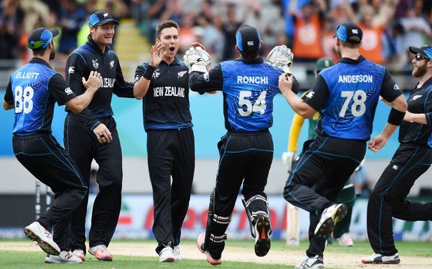 Trent Boult and his Black Caps team mates celebrate a wicket during the World Cup semi final against South Africa at Eden Park.