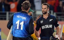 The New Zealand pair Daniel Vettori and Grant Elliott celebrate their victory during the World Cup Semifinal.