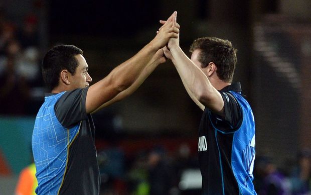Ross Taylor and Matt Henry celebrate New Zealand's Cricket World Cup semi-final victory.