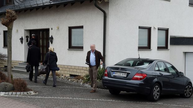 Investigators at the Andreas Lubitz's home in Montabaur, southwestern Germany