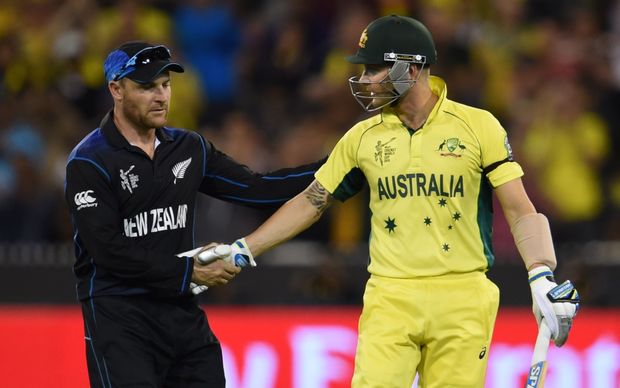 Australian batsman Michael Clarke (R) shakes hands with New Zealand's captain Brendon McCullum.