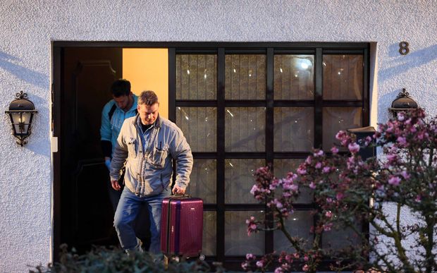 Investigators search Andreas Lubitz's home in Montabaur on 26 March.