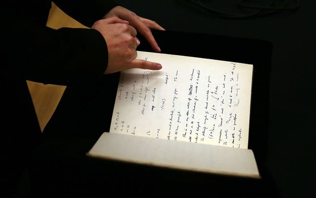 Alan Turing's 56-page notebook has been sold at auction in New York.