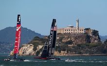 Emirates Team New Zealand and Oracle Team USA during the final race of the America's Cup Finals on September 25, 2013.