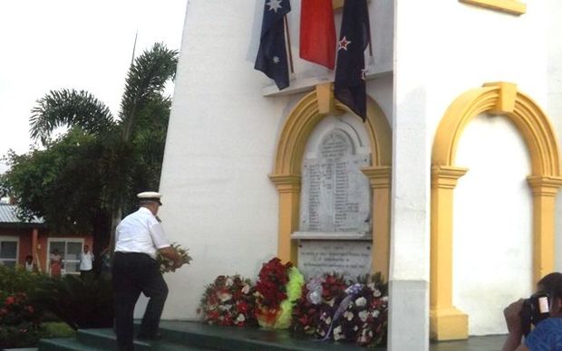 A wreath is laid at an Anzac Day ceremony in Apia, Samoa