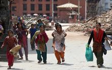 Nepalese residents following fresh tremors in Kathmandu.