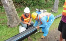 Contractors work on the Te Mato Vai water project in Rarotonga, Cook Islands