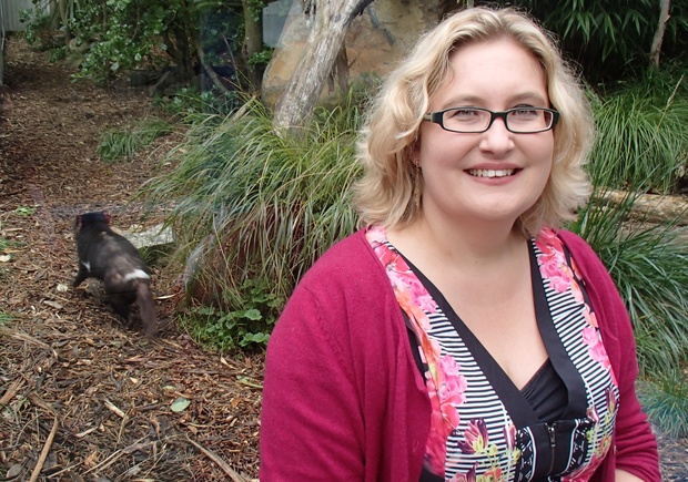 University of Sydney geneticist Kathy Belov at Wellington Zoo with one of their four Tasmanian devils.
