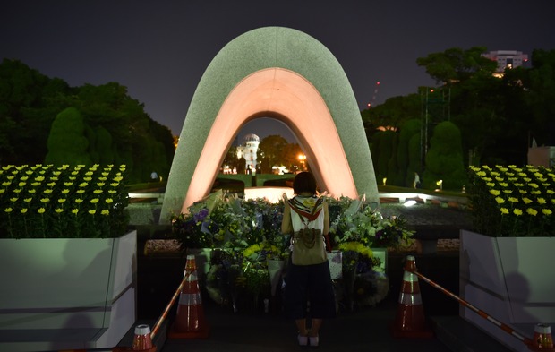 A woman visits the Peace Memorial Park to pray for victims of the atomic bombing in Hiroshima.