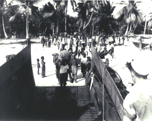 Bikinians in the Marshall Islands being evacuated from their home island after nuclear testing in the area by the US. 