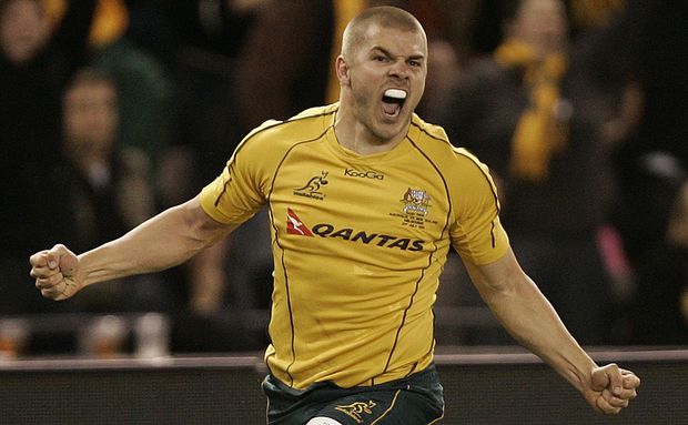 Drew Mitchell celebrates a Bledisloe Cup try in 2010.