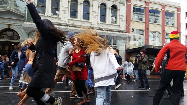 Some Auckland anti-TPP protesters stayed behind to dance in the middle of Customs Street