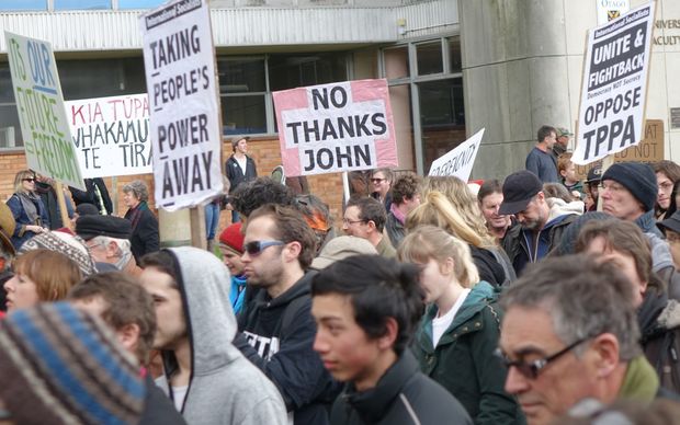 Protesters march in Dunedin against the TPP