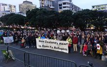 A vigil at Parliament calling for New Zealand to double its refugee quota.