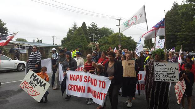 A group of protesters - including members of rival faction Te Kotahitanga - take to the streets to oppose Tūhoronuku's appointment to carry out treaty negotiations on behalf of Ngāpuhi.