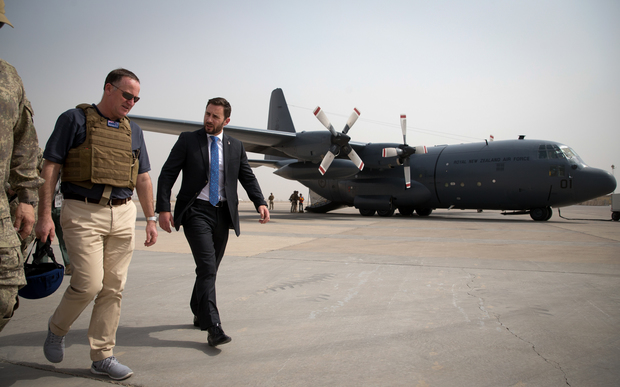 John Key is greeted at Baghdad airport by New Zealand ambassador to Iraq James Monroe.